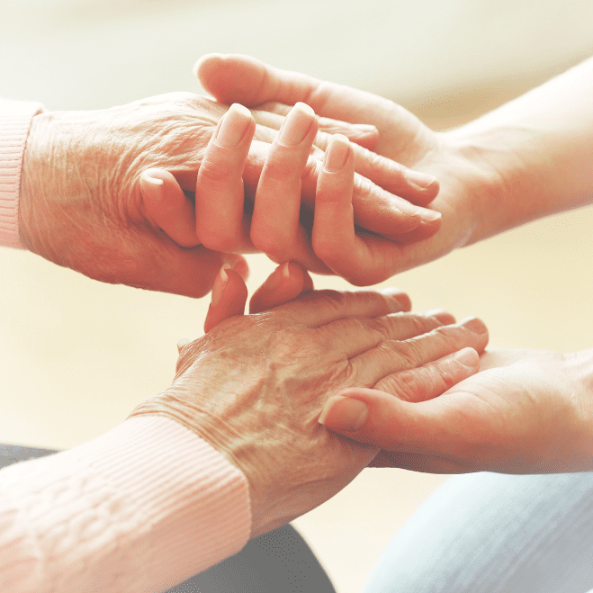 Elderly holding hands