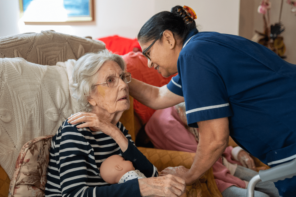 carer talking to resident for alzheimers care