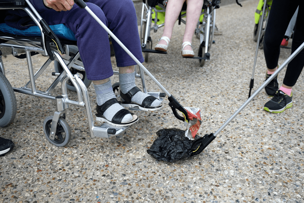 Resident picking up rubbish 